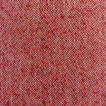 Moroso House of Lords fabric, ruby red herringbone weave with off-white and gold flecks, dense wool-blend texture, matte finish.